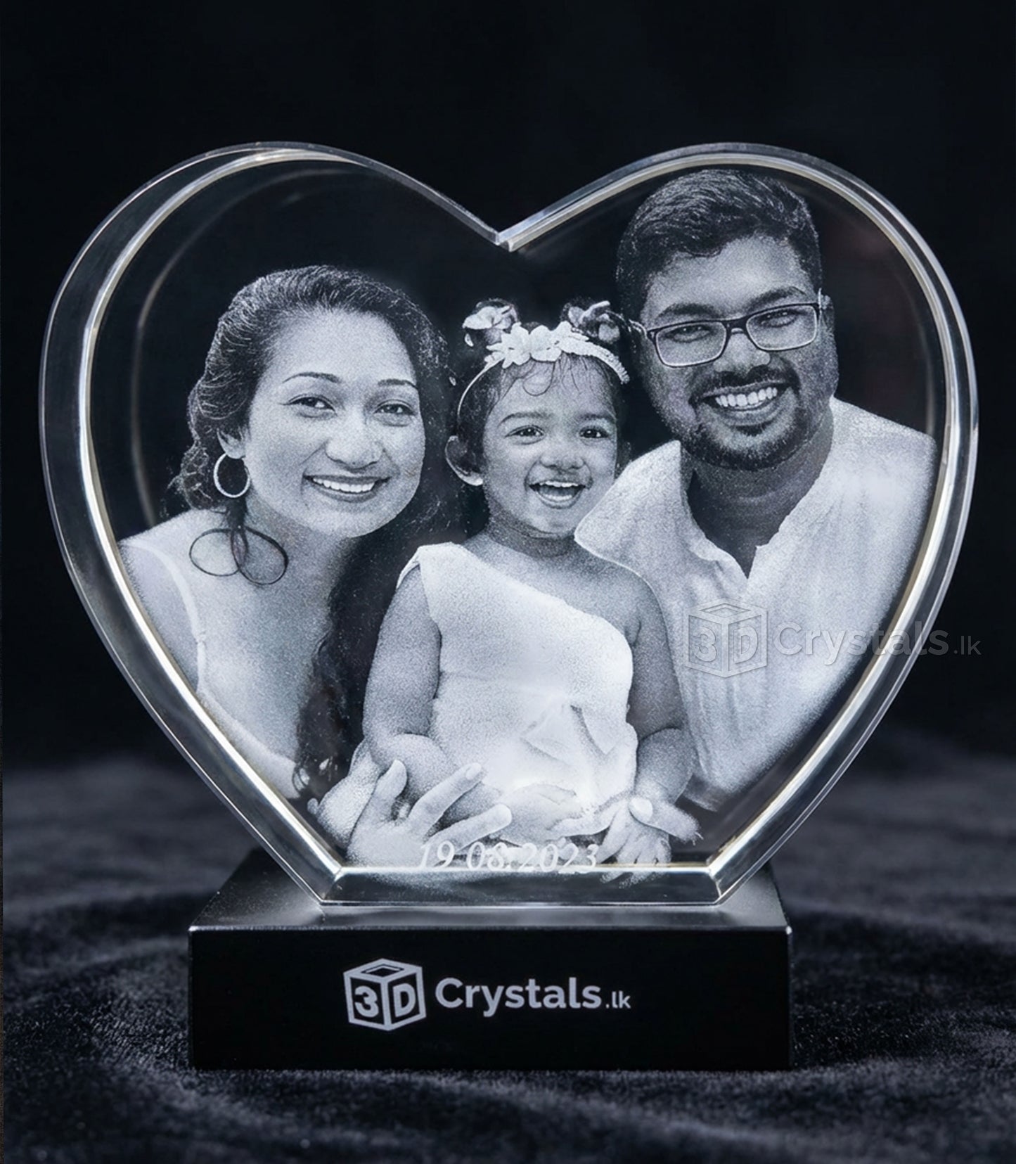 Happy Family in a 3D crystal Heart shape, Sri Lanka's Best 3D Gift shop , 3D crystal Craft , Family anniversary gift , Parents with a kid 3D crystal heart shape on a light base 